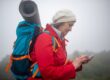 Solo-female-traveler-checking-phone-for-directions
