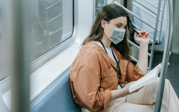 A-lady-in-a-train-reading-a-book