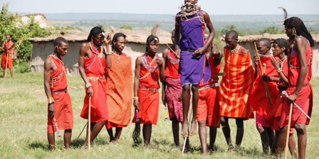 Maasai people dressed in traditional attire performing their iconic jumping dance Maasai-people-dressed-in-traditional-attire-performing-their-iconic-jumping-dance